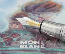 Load image into Gallery viewer, Close up to the nib with engraved decorations, 4810 logo, and a nut cracker doll. 
