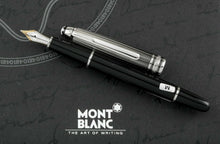 Load image into Gallery viewer, The fountain pen with the cap next to it.
