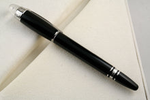 Load image into Gallery viewer, Back view of the fountain pen with the cap on.

