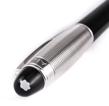 Load image into Gallery viewer, Angled top view of the pen cap with the Montblanc logo at the top.
