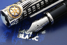 Load image into Gallery viewer, Angled close up to the pen's nib and cap.
