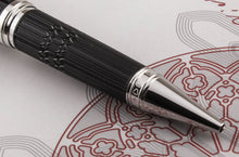 Load image into Gallery viewer, Close up to the engraved decorations by silver grip section.
