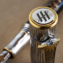 Load image into Gallery viewer, Angled close up to the top of the cap and clip.
