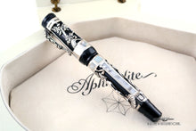 Load image into Gallery viewer, Side view of the fountain pen in the presentation box. 
