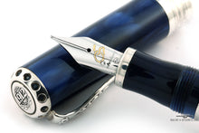 Load image into Gallery viewer, Close up to the fountain pen nib resting on the cap.
