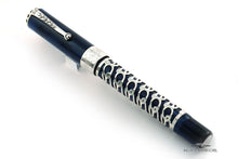 Load image into Gallery viewer, Angled front view of the fountain pen with the cap on.
