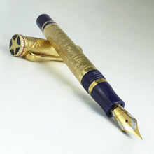 Load image into Gallery viewer, Angled view of the fountain pen resting on the cap.
