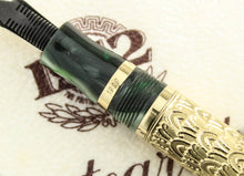 Load image into Gallery viewer, Close up to the gold band on the grip section with 1999 engraving

