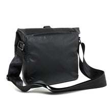 Load image into Gallery viewer, Angled back view of the messenger bag. 
