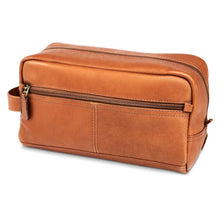 Load image into Gallery viewer, Angled front view of the tan leather toiletry bag. 
