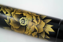 Load image into Gallery viewer, Close up to the peony flower on the pen barrel. 
