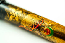 Load image into Gallery viewer, Close up to the decorations on the pen body.

