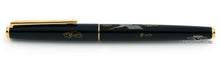 Load image into Gallery viewer, Side view of the fountain pen with the cap on.
