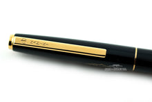 Load image into Gallery viewer, Close up to the pen's cap clip, with engraved Namiki logo.

