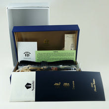 Load image into Gallery viewer, The fountain pen arranged in the presentation box with the outer box, certificates, and pen case. 
