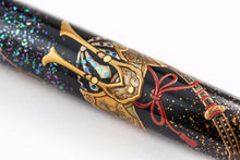 Load image into Gallery viewer, Close up to the kabuto helmet on the pen barrel.
