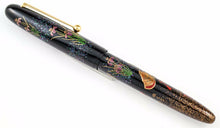 Load image into Gallery viewer, Side view of the fountain pen with the cap on.
