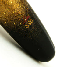Load image into Gallery viewer, Close up to the artist signature on the pen.
