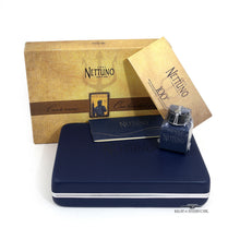 Load image into Gallery viewer, The blue presentation box arranged with the yellow card stock box, booklets and ink bottle. 
