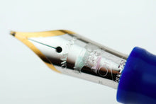 Load image into Gallery viewer, Close up to the fountain pen with engraved decorations and text: OMAS 2000, OMAS 18K-750
