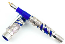 Load image into Gallery viewer, Front view of the fountain pen resting on the cap. 
