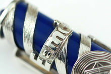 Load image into Gallery viewer, Close up to Einstein's Mass-energy equivalence formula engraved on the cap's silver overlay.
