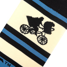 Load image into Gallery viewer, Close up to the Elliott and E.T. bike riding design on the compression socks.
