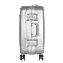 Load image into Gallery viewer, Side panel view of the silver colored suitcase. It features two three-digit combination clasp locks.
