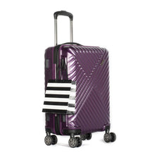Load image into Gallery viewer, Angled front view of the purple suitcase. A small shopping bag hangs from the side panel's hook.
