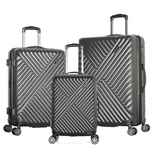Load image into Gallery viewer, The metal gray carry-on, medium, and large suitcases arranged on a white background. 
