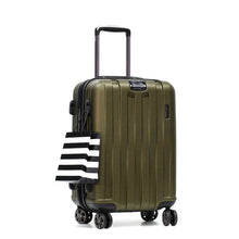 Load image into Gallery viewer,  Angled front view of the olive green suitcase with a shopping bag hanging from the side.
