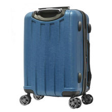 Load image into Gallery viewer, Angled back panel view of the navy blue suitcase.
