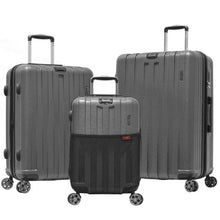Load image into Gallery viewer, The carry-on, medium, and large charcoal gray hard shell suitcases. 
