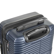 Load image into Gallery viewer, Angled top view of the navy blue suitcase. It features a grip handle and a telescopic handle. 
