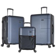 Load image into Gallery viewer, The navy blue carry-on, medium, and large suitcases arranged on a white background. 

