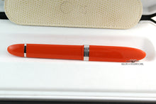 Load image into Gallery viewer, Back view of the orange pen in the presentation box.
