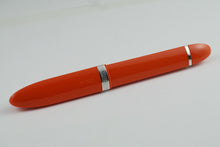 Load image into Gallery viewer, Angled back view of the pen with the cap on.
