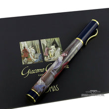 Load image into Gallery viewer, Side view of the fountain pen arranged on the included booklet. 
