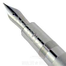 Load image into Gallery viewer, Close up to the nib and grip section of the fountain pen. 
