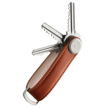 Load image into Gallery viewer, Tan leather organizer with three keys attached to it.
