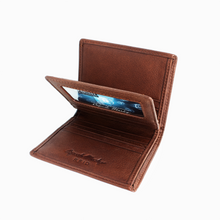 Load image into Gallery viewer, Interior view of the brandy leather wallet. 
