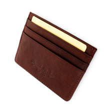 Load image into Gallery viewer, Angled view of the brandy leather card case.
