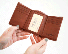 Load image into Gallery viewer, Animated GIF of two hands opening and closing a brandy brown wallet. 

