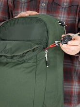 Load image into Gallery viewer, interior view of the front panel pocket with a key sling.
