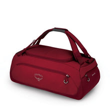 Load image into Gallery viewer, Angled side view of the Cosmic Red duffle bag.
