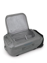 Load image into Gallery viewer, Interior view of the smoke grey wheeled duffle. 
