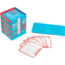 Load image into Gallery viewer, The cards, instructions and packaging arranged on a white background.
