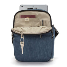 Load image into Gallery viewer, Front view with the main compartment unzipped. A passport is in the RFID compartment. A tablet, and keys are arranged in the compartments. 
