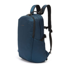 Load image into Gallery viewer, Angled side panel view of the blue backpack with the shoulder straps extended.
