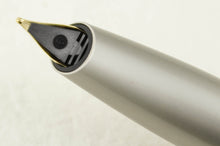 Load image into Gallery viewer, Close up to the fountain pen feed, with a number 6 engraved on it.
